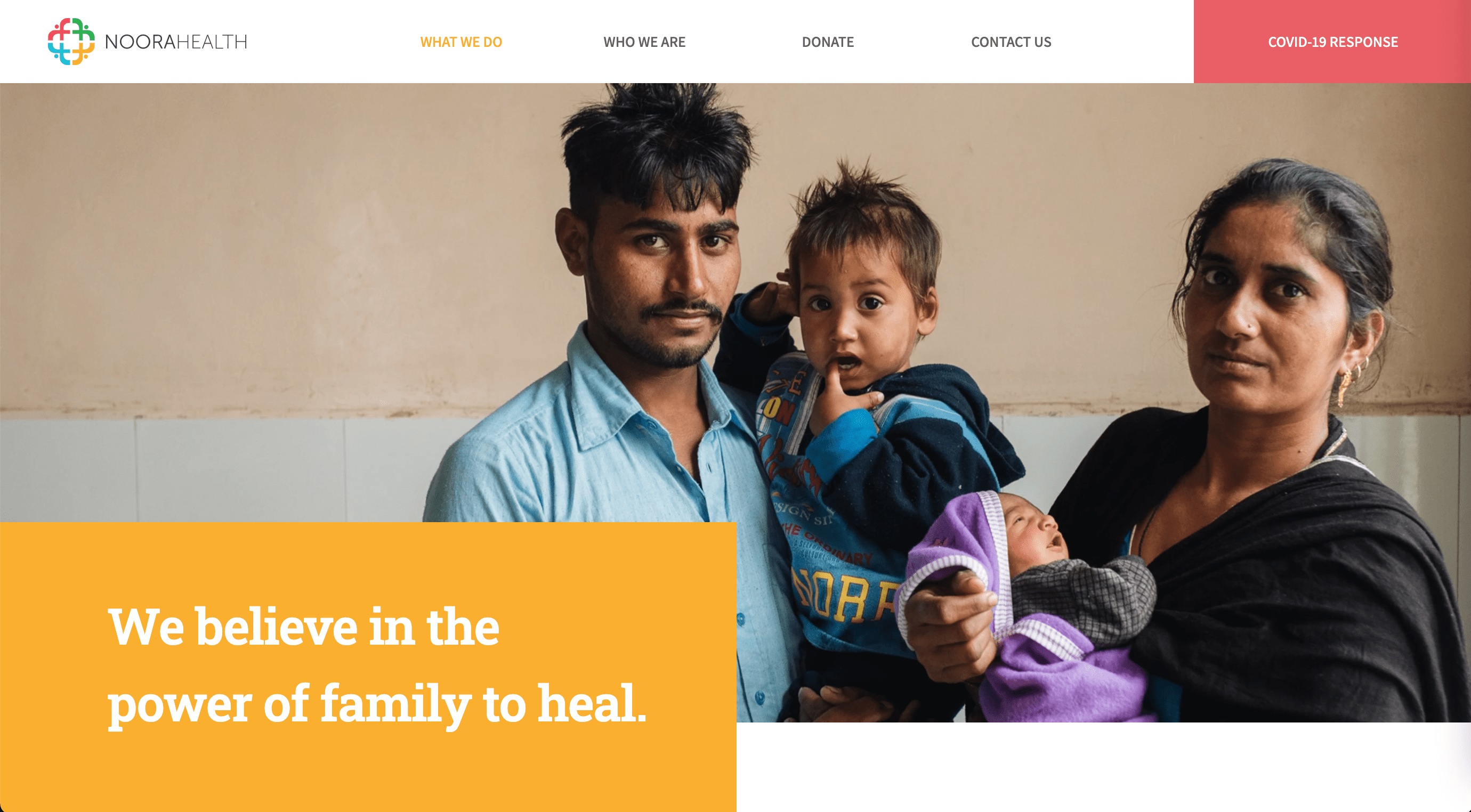 Picture of man holding his young son with serious faces and a tagline reading "we believe in the power of family to heal."