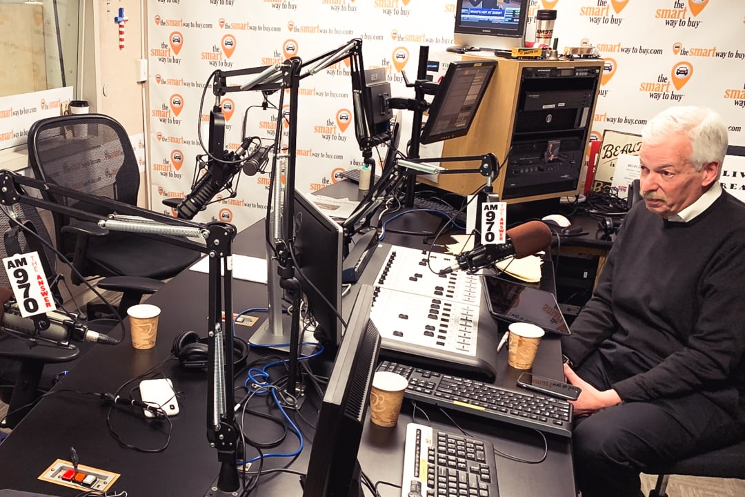 The Business of Giving podcast host Denver Frederick in his studio.